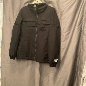 New Balance womens Lg soft shell jacket front zip.